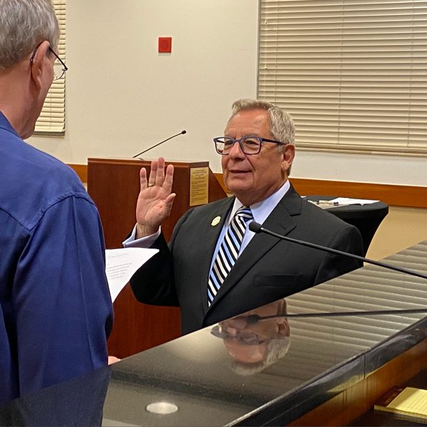 Paul Rolli, shown here being sworn in as Wilton Manors Commissioner in 2022, has a long history of building bridges and his endorsements show that!